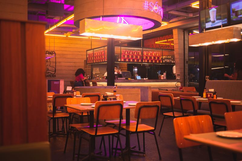 Wings over franchise restaurant interior — vibrant dining experience